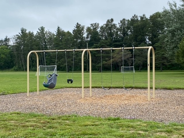 Heritage Park Playground swing set.