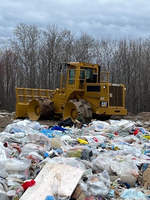 Heavy equipment at a landfill site.