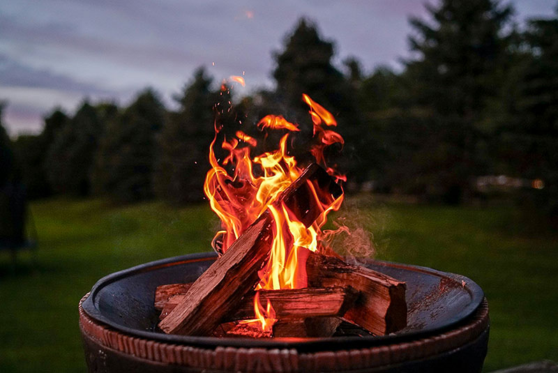 A campfire in a fire bowl.