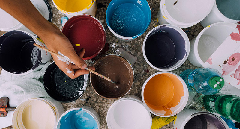 Open paint cans. Paint can be picked up for free at the landfill.